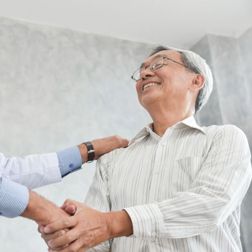 Doctor shaking hands with an international patient